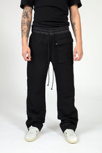 Load image into Gallery viewer, Mens black drawstring baggy casual luxury fashion mens trousers close up view front with white sneakers